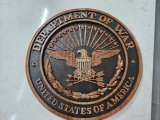 Hand carved Department of War Seal, black background
