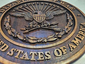 Hand carved Department of War Seal, Brown background